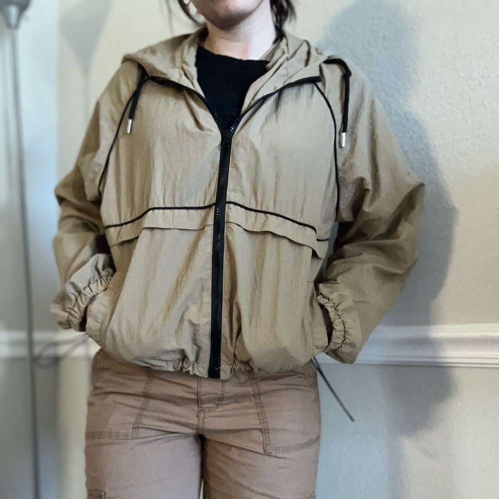 Hooded beige wind breaker jacket